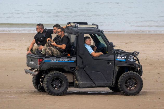 August 9, 2026, Berck, France: Berck, France. French police at the Beach in Berck Northern France as migrants aboard an inflatable boat attempting to cross the English Channel. Berck France  - ZUMAl94_ 20260809_zaf_l94_020 Copyright: xMarcinxNowakx
