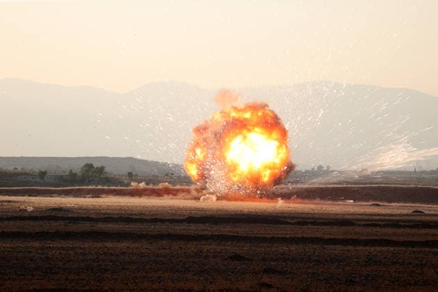 Syrian teams destroy explosive remnants of war near Damascus DAMASCUS, SYRIA - AUGUST 9: Syrian Defense Ministry teams destroy approximately one ton of explosive remnants of war and explosives found in residential areas in the countryside of Damascus, Syria, on August 9, 2026. Heavy flames and smoke rise from the area during the controlled destruction operation carried out by the Syrian authorities. Izz Aldien Alqasem Anadolu Damascus Syria. Editorial use only. Please get in touch for any other usage.  Copyright: x2026xAnadoluxIzzxAldienxAlqasemx