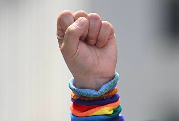 August 9, 2026, Montreal, Pq, Canada: A participant raises a fist during the Pride parade in Montreal, on Sunday, Aug. 9, 2026. Montreal Canada  - ZUMAc35_ 20260809_zaf_c35_036 Copyright: xGrahamxHughesx