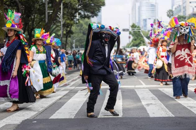 Indigenous Cultures Parade Through Mexico City MEXICO CITY, MEXICO AUGUST 9, 2026: Participants wearing traditional clothing dance and march during the 17th Mega Calenda cultural parade from the Angel of Independence to the Zocalo in Mexico City, August 9, 2026. Organized by the Mexico City government, the event commemorates the International Day of the World s Indigenous Peoples and is part of the 12th Festival of Indigenous Cultures, Indigenous Peoples, and Native Neighborhoods of Mexico City. Mexico City Mexico Copyright: x xCristianxLeyvax xJNAxPressx