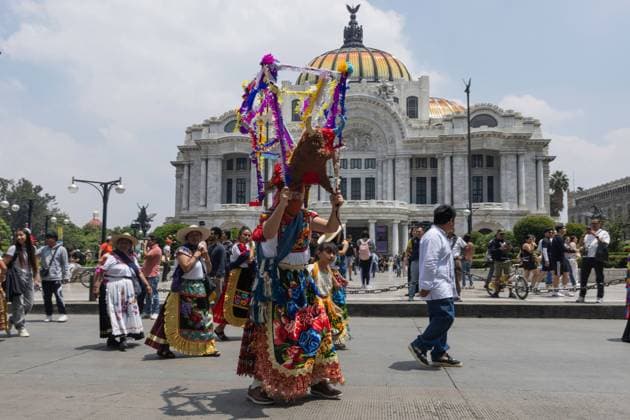 August 9, 2026, Mexico City, Mexico: MEXICO Mexico City, MEXICO †AUGUST 9, 2026: Participants wearing traditional clothing dance and march during the 17th Mega Calenda cultural parade from the Angel of Independence to the Zocalo in Mexico City, August 9, 2026. Organized by the Mexico City government, the event commemorates the International Day of the World s Indigenous Peoples and is part of the 12th Festival of Indigenous Cultures, Indigenous Peoples, and Native Neighborhoods of Mexico City. Mexico City Mexico - ZUMAq101 20260809_zna_q101_162 Copyright: xCristianxLeyvax