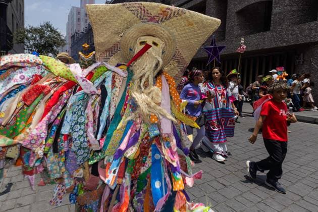 August 9, 2026, Mexico City, Mexico: MEXICO Mexico City, MEXICO †AUGUST 9, 2026: Participants wearing traditional clothing dance and march during the 17th Mega Calenda cultural parade from the Angel of Independence to the Zocalo in Mexico City, August 9, 2026. Organized by the Mexico City government, the event commemorates the International Day of the World s Indigenous Peoples and is part of the 12th Festival of Indigenous Cultures, Indigenous Peoples, and Native Neighborhoods of Mexico City. Mexico City Mexico - ZUMAq101 20260809_zna_q101_166 Copyright: xCristianxLeyvax