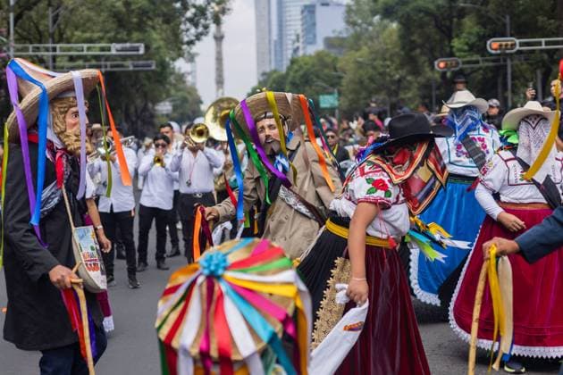 August 9, 2026, Mexico City, Mexico: MEXICO Mexico City, MEXICO †AUGUST 9, 2026: Participants wearing traditional clothing dance and march during the 17th Mega Calenda cultural parade from the Angel of Independence to the Zocalo in Mexico City, August 9, 2026. Organized by the Mexico City government, the event commemorates the International Day of the World s Indigenous Peoples and is part of the 12th Festival of Indigenous Cultures, Indigenous Peoples, and Native Neighborhoods of Mexico City. Mexico City Mexico - ZUMAq101 20260809_zna_q101_168 Copyright: xCristianxLeyvax