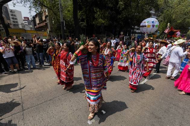August 9, 2026, Mexico City, Mexico: MEXICO Mexico City, MEXICO †AUGUST 9, 2026: Participants wearing traditional clothing dance and march during the 17th Mega Calenda cultural parade from the Angel of Independence to the Zocalo in Mexico City, August 9, 2026. Organized by the Mexico City government, the event commemorates the International Day of the World s Indigenous Peoples and is part of the 12th Festival of Indigenous Cultures, Indigenous Peoples, and Native Neighborhoods of Mexico City. Mexico City Mexico - ZUMAq101 20260809_zna_q101_170 Copyright: xCristianxLeyvax