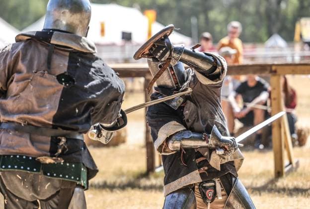 Kingdom of Loxwood medieval festival 09.08.2026. Members of the Full contact medieval armoured combat group Invicta take part in mass combat at the Kingdom of Loxwood medieval festival in west Sussex  Copyright: xRichardxPohlex NINTCHDBPICT001100253821