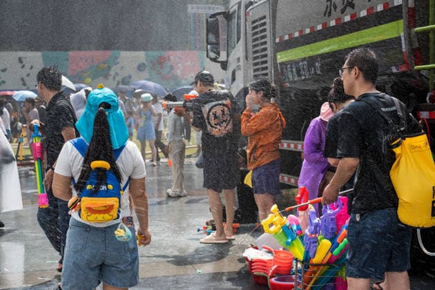 GUIYANG, CHINA - AUGUST 09: Citizens and tourists splash water on each other during the Summer Wonderland Ethnic Group Celebration at Guanshanhu Park on August 9, 2026 in Guiyang, Guizhou Province of China. The event features water splashing activities allowing participants to cool off during the summer heat.  Copyright: xVCGx 111659117630