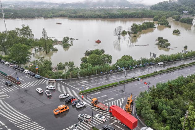 WENZHOU, CHINA - AUGUST 10: An aerial view shows villages and farmland submerged by floodwaters following Typhoon Haishen on August 10, 2026 in Wenzhou, Zhejiang Province of China. Strong winds up to level 15 (46.2 to 50.9 meters per second) have ripped through Yueqing City in east China s Zhejiang Province since Typhoon Dolphin made landfall in the region on Sunday, with hundreds of toppled trees and broken branches blocking roads across the city.  Copyright: xVCGx 111659124821