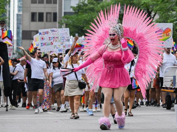 August 9, 2026, Montreal, Pq, Canada: A participant entertains the crowd during the Pride parade in Montreal, on Sunday, Aug. 9, 2026. Montreal Canada  - ZUMAc35_ 20260809_zaf_c35_173 Copyright: xGrahamxHughesx