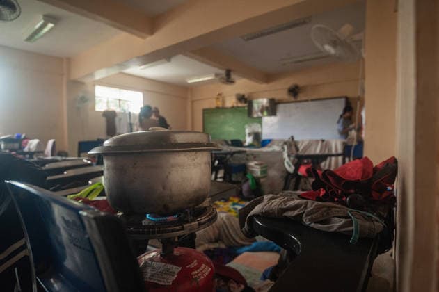 August 11, 2026, Quezon City, Quezon, Philippines: Evacuees in the residential areas of Quezon CIty, located near the currently overflowing La Mesa Dam seek shelter in a nearby school as flood and mud sweep through their streets and houses. Quezon City Philippines  - ZUMAy102 20260811_zip_y102_008 Copyright: xKenosisxYapx