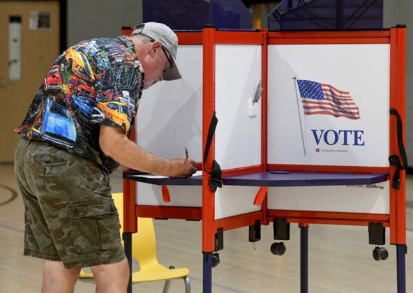 August 11, 2026, Racine, Wisconsin, USA: ROBB LUEHR votes at Jerstad Agerholm School in Racine in the Wisconsin primary election Tuesday August 11, 2026. National focus is on the Democratic gubernatorial primary and on efforts to flip several Republican congressional seats, including that of incumbent Bryan Steil who represents the First Congressional District, including Racine County. Racine USA  - ZUMAh154 20260811_znp_h154_014 Copyright: xMarkxHertzbergx