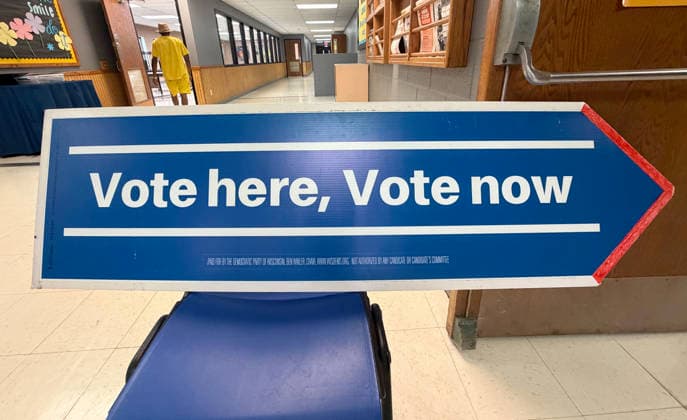 August 11, 2026, Racine, Wisconsin, USA: A sign directs voters at the Tyler Domer Community Center in Racine in the Wisconsin primary election Tuesday August 11, 2026. National focus is on the Democratic gubernatorial primary and on efforts to flip several Republican congressional seats, including that of incumbent Bryan Steil who represents the First Congressional District, including Racine County. Racine USA - ZUMAh154 20260811_znp_h154_030 Copyright: xMarkxHertzbergx