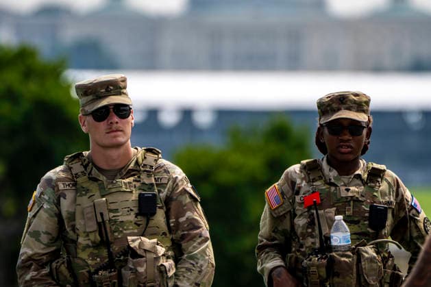 Members of the National Guard patrol near the Washington Monument in Washington, DC on Tuesday, August 11, 2026. Today marks the one year anniversary the National Guard troops, more than 4,600 at present, have patrolled the streets of Washington, DC, after President Donald Trump deployed them in August 2025.  WAP2026081126359 BONNIExCASH