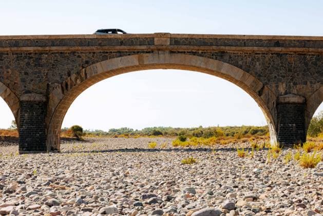 Illustration - Drought in Corsica - France Illustrations of the severe drought affecting Corsica, France are seen in Galeria on August 11, 2026, with the Fango River completely dry at the Pont des Cinq Arcades and parched lands in the Marsulinu valley. Photo by Shootpix ABACAPRESS.COM Galeria France  Copyright: xShootpix ABACAx