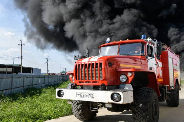 RUSSIA, KRASNODAR REGION - AUGUST 12, 2026: Smoke billows over a warehouse storing plastic products, hit by fire in the village of Lenina, southeast of Krasnodar. The fire covering an area of 2.2 thousand sq m has been contained. Roman Sokolov TASS  96069792