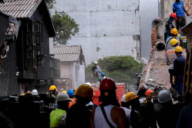 Coiombia Earthquake Aftermath People gather outside collapsed buildings in Cali, Colombia on August 12, 2026 to aid in several rescue labors after a 7,4 magnitude earthquake that struck the cities of Quibdo, Cali, Pereira and Manizales leaving more than 200 casualties past august 10. Cali Valle del Cauca Colombia Copyright: xMartinxStevenxAngelx