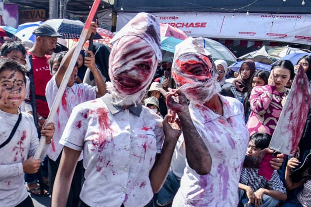 August 13, 2026, West Bandung Regency, West Java, Indonesia: Participants pose for a photo and wearing a ghost costumes during a carnival commemorating the 81st anniversary of the Indonesia s independence in Lembang, West Bandung Regency, Indonesia. The carnival, which was held to celebrate the 81st anniversary of the Republic of Indonesia s independence, the carnival drew thousands of villagers who showcased costume and cultural parades as well as traditional attire. West Bandung Regency Indonesia - ZUMAr272 20260813_zip_r272_015 Copyright: xDimasxRachmatsyahx