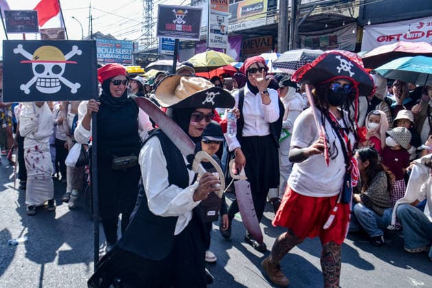 August 13, 2026, West Bandung Regency, West Java, Indonesia: Participants are wearing pirate costumes and carrying a flag from the Japanese anime series One Piece during a carnival commemorating the 81st anniversary of the Indonesia s independence in Lembang, West Bandung Regency, Indonesia. The carnival, which was held to celebrate the 81st anniversary of the Republic of Indonesia s independence, the carnival drew thousands of villagers who showcased costume and cultural parades as well as traditional attire. West Bandung Regency Indonesia - ZUMAr272 20260813_zip_r272_019 Copyright: xDimasxRachmatsyahx