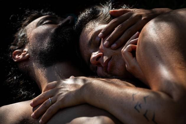 August 13, 2026, Paredes De Coura, Braga, Portugal: Festivalgoers hold each other and rest by the river Coura known locally as Couraiso during the daytime at Vodafone Paredes de Coura. Paredes De Coura Portugal - ZUMAs197 20260813_aab_s197_022 Copyright: xDiogoxBaptistax