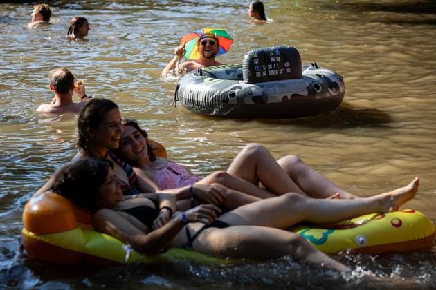 August 13, 2026, Paredes De Coura, Braga, Portugal: Festivalgoers float on inflatable rings at the river Coura Ã¢â‚¬ known locally as Ã¢â‚¬oeCouraoÂ­soÃ¢â‚¬Â Ã¢â‚¬ during the daytime at Vodafone Paredes de Coura. Paredes De Coura Portugal - ZUMAs197 20260813_aab_s197_023 Copyright: xDiogoxBaptistax