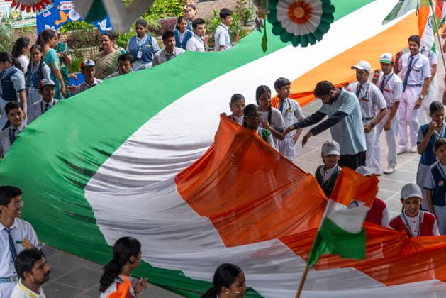 August 14, 2026, New Delhi, Delhi, India: Students and teachers take part in a Tiranga Yatra as a Delhi school celebrates IndiaÃ¢â‚¬â ¢s 80th Independence Day in New Delhi. Students carry a 100 foot long Indian national flag during the procession, promoting a message of unity, solidarity and national pride. New Delhi India  - ZUMAt180 20260814_zip_t180_006 Copyright: xJaixThakurx