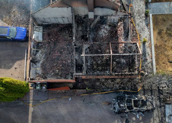 August 14, 2026, Stourbridge, West Midlands, UK: Stourbridge, UK. Damaged caused to homes and cars in the Stourbridge area of Birmingham, West Midlands, after fires broke out yesterday afternoon in record temperatures. The UK experienced its hottest day of the year on Thursday, with a peak of 38.1 degrees celsius recorded at Kew Gardens. Stourbridge UK  - ZUMAl94_ 20260814_zaf_l94_012 Copyright: xIoannisxAlexopoulosx