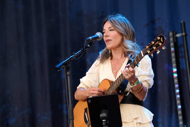 August 14, 2026, Williamscot, Oxfordshire, United Kingdom: Vocalist and guitarist Charley Webb, of Marshall Gilmour Webbs, performing live on stage at Fairport s Cropredy Convention. Williamscot United Kingdom - ZUMAs197 20260814_aaa_s197_090 Copyright: xDawnxFletcher-Parkx