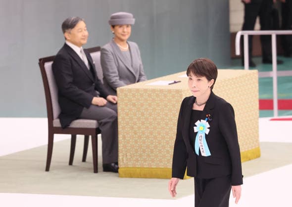 August 15, 2026, Tokyo, Japan - Japanese Prime Minister Sanae Takaichi (R) walks for a speech at the memorial service for the war dead at the Nippon Budokan hall in Tokyo on Saturday, August 15, 2026, while Emperor Naruhito (L) and Empress Masako (2nd L) look on. Japan marked the 81st anniversary of its surrender of World War II. (photo by Yoshio Tsunoda AFLO)  aflo_341018769