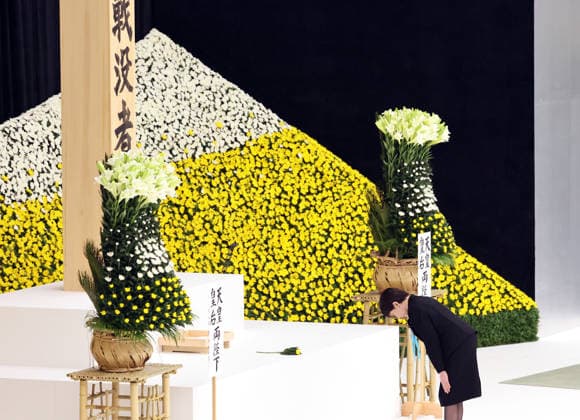 August 15, 2026, Tokyo, Japan - Japanese Prime Minister Sanae Takaichi bows her head as she offers a chrysanthemum on an altar at the memorial service for the war dead at the Nippon Budokan hall in Tokyo on Saturday, August 15, 2026. Japan marked the 81st anniversary of its surrender of World War II. (photo by Yoshio Tsunoda AFLO)  aflo_341018803