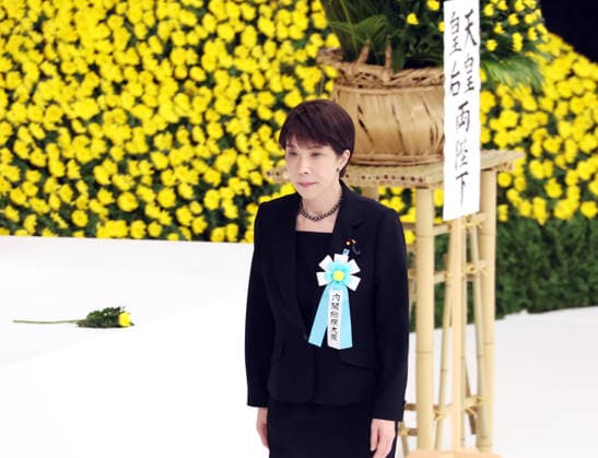 August 15, 2026, Tokyo, Japan - Japanese Prime Minister Sanae Takaichi offers a chrysanthemum on an altar at the memorial service for the war dead at the Nippon Budokan hall in Tokyo on Saturday, August 15, 2026. Japan marked the 81st anniversary of its surrender of World War II. (photo by Yoshio Tsunoda AFLO)  aflo_341018804