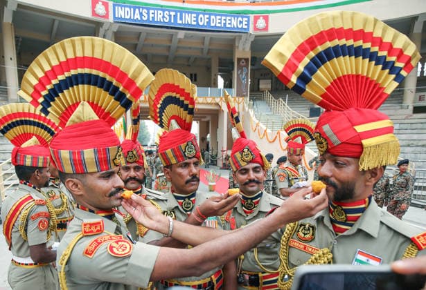 RECORD DATE NOT STATED 80th Independence Day celebrations at the Attari Wagha border Amritsar, Aug 15 (ANI): Border Security Force (BSF) soldiers offer sweets to each other during the Beating Retreat ceremony on the occasion of 80th Independence Day, at Attari Wagha border, in Amritsar on Saturday. Amritsar Punjab India Copyright: xANIx ANI_20260815432
