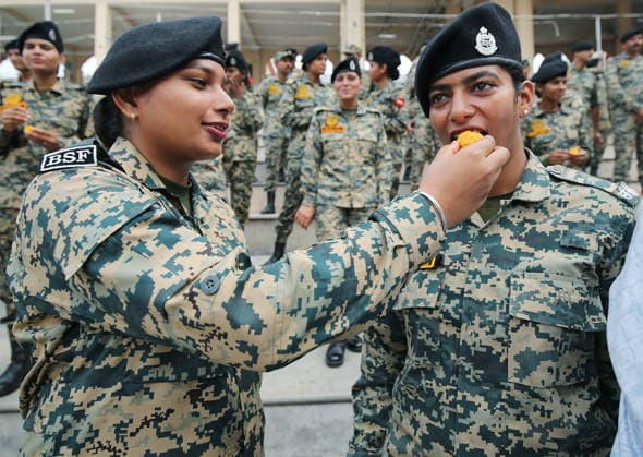 RECORD DATE NOT STATED 80th Independence Day celebrations at the Attari Wagha border Amritsar, Aug 15 (ANI): Border Security Force (BSF) soldiers offer sweets to each other during the Beating Retreat ceremony on the occasion of 80th Independence Day, at Attari Wagha border, in Amritsar on Saturday. Amritsar Punjab India Copyright: xANIx ANI_20260815493