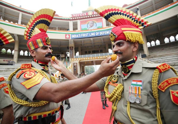 RECORD DATE NOT STATED 80th Independence Day celebrations at the Attari Wagha border Amritsar, Aug 15 (ANI): Border Security Force (BSF) soldiers offer sweets to each other during the Beating Retreat ceremony on the occasion of 80th Independence Day, at Attari Wagha border, in Amritsar on Saturday. Amritsar Punjab India Copyright: xANIx ANI_20260815496