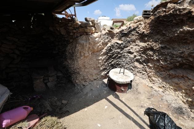 August 16, 2026, Masafer Yatta, Palestine, State of: MASAFER YATTA, WEST BANK, PALESTINE, AUGUST 16, 2026: Palestinian Abdullah Dababseh holds his phone displaying a demolition order issued by the Israeli army for the cave where he lives in Khirbet Khallet Al-Dabaa, south of Hebron. According to local residents, demolition orders were issued for three homes, three caves, a school, trees and crops in the area. Residents said the village was demolished in May 2025, forcing some Palestinians to live in caves. Masafer Yatta Palestine, State of - ZUMAq101 20260816_zna_q101_099 Copyright: xMosabxShawerx