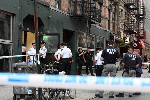 Police Involved Shooting At 126 Ludlow Street In New York City NEW YORK CITY, UNITED STATES - AUGUST 16: NYPD officers work at the scene where a suspect carrying a butcher knife was shot by officers at 126 Ludlow Street within the confines of the 7th Precinct in Manhattan, New York, United States on Sunday, August 16, 2026. A victim was reportedly stabbed at the location and sustained an injury to the head, the suspect when confronted by officers was shot after charging at them with a butcher knife. NYPD officers gave commands to drop the knife to the suspect. The investigation is ongoing by the NYPD. Kyle Mazza Anadolu New York United States. Editorial use only. Please get in touch for any other usage.  Copyright: x2026xAnadoluxKylexMazzax