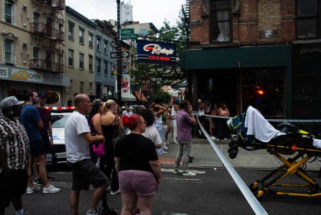 August 16, 2026, New York City, New York, USA: NYPD officers shot and killed a man they said was armed with a butcher s knife inside an apartment building on the Lower East Side Sunday, August 16th, 2026 afternoon. Officers were called out to the building for reports of an assault. When they got there, they said they found a blood trail on the stairs. Officers followed the blood trail, and found a man, identified as 54-year-old Wei Chan, who they said was armed with a butcher s knife. According to the department, officers ordered Chan to show his hands multiple times, and he refused. That s when officers shot Chan. .Wei Chan was taken to a nearby hospital where he was later pronounced dead. The shooting happened around 4 p.m. at a building - ZUMAt442 20260816_znp_t442_002 Copyright: xBillyxTompkinsx