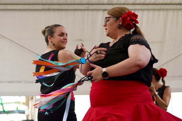 Scene at the 2026 Málaga Fair: Several women, dressed in traditional flamenco outfits, stroll through the Cortijo de Torres grounds during the Málaga Fair. August 17, 2026, in Málaga, Andalusia, Spain. The capital of the Costa del Sol celebrates its big week, during which locals and visitors gather to enjoy the festive atmosphere and the many activities the Feria has to offer. August 17, 2026, in Málaga, Andalusia, Spain Málaga, Andalusia, Spain Spain Copyright: xÃlexxZeax 7718773