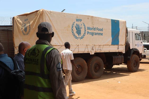 August 26, 2026, Juba, Ces Juba, South Sudan: Japan has announced a 2.2 million US dollars contribution to support the World Food Programme ( WFP ) in addressing malnutrition and providing lifesaving assistance to vulnerable communities across South Sudan..The contribution comes as South Sudan continues to face one of the world most severe hunger crises, driven by conflict, displacement, climate shocks and economic pressures..The funding will support WFP efforts to strengthen its malnutrition response and provide essential, lifesaving assistance to vulnerable populations, particularly communities affected by food insecurity and humanitarian emergencies. In Photo : A security officer stands at the entrance of the WFP Warehouse in Hai Gwudu - ZUMAb132 20260826_zip_b132_032 Copyright: xSamirxBolx