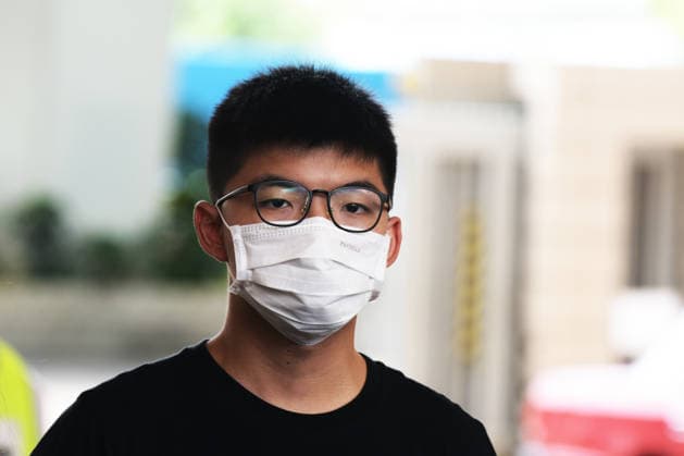 Demosisto Society FILE PHOTO - Joshua Wong Chi-fung of DemosistÅ? Society meeting media at West Kowloon Magistrates Courts on August 5, 2020 in Hong Kong. (Photo by Kobe Li Nexpher Images) Hong Kong