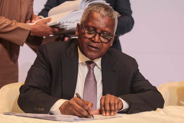 Dangote Refinery Signs N2.15 Trillion IPO Documents In Lagos, Nigeria Aliko Dangote, President and Chief Executive Officer of Dangote Industries Limited, signs documents for the initial public offering of Dangote Petroleum Refinery and Petrochemical, valued at 2.15 trillion naira (US$1.6 billion), at Eko Hotels in Victoria Island, Lagos, Nigeria, on September 7, 2026. The offering is intended to expand the refinery s capacity to 1.4 million barrels per day from the current 700,000. Victoria Island, Lagos Nigeria Copyright: xAdekunlexAjayix originalFilename: ajayi-notitle260907_npBaC.jpg