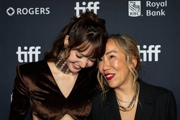 September 11, 2026, Toronto, On, Canada: Lisa, left, and Sue Kim pose for a photograph on the red carpet for Always Lalisa at the Toronto International Film Festival, in Toronto on Friday, Sept. 11, 2026. Toronto Canada  - ZUMAc35_ 20260911_zaf_c35_335 Copyright: xArlynxMcadoreyx