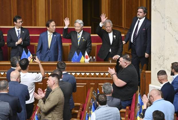 Japan lower house speaker in Ukrainian parliament Japanese House of Representatives Speaker Eisuke Mori (back, 2nd from R) waves after delivering a speech in the Ukrainian parliament in Kyiv on Sept. 15, 2026.  A14AA0005627625P