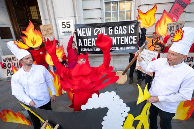 September 16, 2026, London, United Kingdom: Activists from Fossil Free London stage a protest outside the Department for Energy Security and Net Zero (DESNZ) in Whitehall. The protest feature a giant lobster inside a cooking pot surrounded by demonstrators dressed as ˜Shell chefs™. The lobster represents a planet being pushed towards dangerous levels of warming, while the ˜Shell chefs™ represent the fossil fuel industry continuing to pursue new oil and gas projects. The action comes as the Government faces pressure over new North Sea oil and gas developments, including the Rosebank and Jackdaw fields. London United Kingdom  - ZUMAs197 20260916_aaa_s197_021 Copyright: xAndreaxDomeniconix