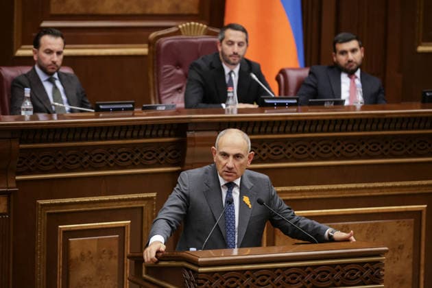ARMENIA, YEREVAN - SEPTEMBER 16, 2026: Armenia s Prime Minister Nikol Pashinyan (foreground) addresses the Armenian Parliament during the second session of its 9th convocation. Alexander Patrin TASS  97822454