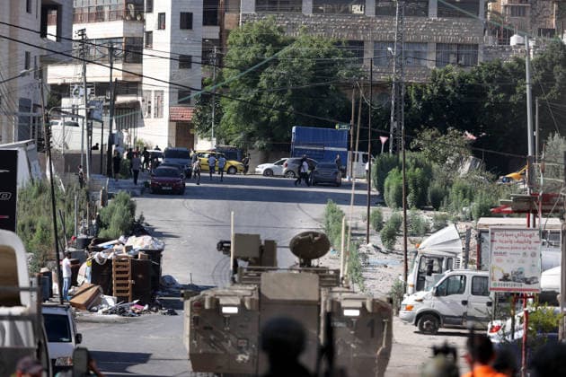 Israeli army continues to raid West Bank NABLUS, WEST BANK, PALESTINE - SEPTEMBER 17 : Israeli soldiers take up positions and maintain security measures during a military raid on the Ain Refugee Camp in Nablus, West Bank, Palestine on September 17, 2026. Israeli forces restricted the movement of local Palestinians during the operation in the refugee camp. Issam Rimawi Anadolu Nablus West Bank. Editorial use only. Please get in touch for any other usage.  Copyright: x2026xAnadoluxIssamxRimawix
