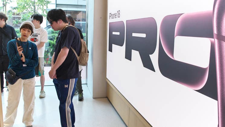 Customers try out the new iPhone 18 pro during the launch day the Apple store Ginza in Tokyo, Japan on Friday, September 18, 2026.  TKP2026091805 KEIZOxMORI
