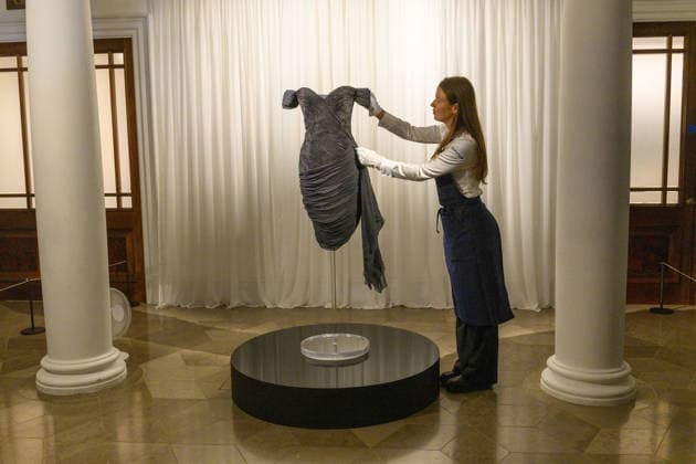 Princess Diana s Historic Revenge Dress at Sotheby’s Auction House London LONDON, UNITED KINGDOM - SEPTEMBER 18: Sothebys’s Auction House London unveil the late Princess Diana’s Revenge Dress in London, United Kingdom on September 18, 2026. The iconic black silk evening dress by designer Christina Stambolian, was worn by Diana, Princess of WaleWales, at the Serpentine Gallery in 1994. The dress will be offered on 9 December during Sotheby’s luxury week in New York with an estimate of £110-220,000 ($150,000-300,000). Ray Tang Anadolu London United Kingdom. Editorial use only. Please get in touch for any other usage.  Copyright: x2026xAnadoluxRayxTangx