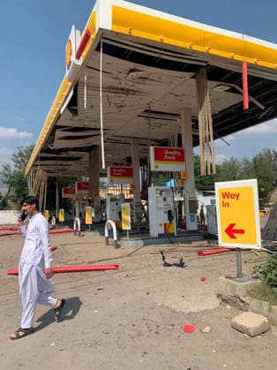 (260918) -- KOHAT, Sept. 18, 2026 -- This photo taken with mobile phone shows a blast site at Kohat in Pakistan s Khyber Pakhtunkhwa province on Sept. 18, 2026. At least 16 people were killed and over 50 others injured in a twin suicide attack inside a residential compound of police in Pakistan s Khyber Pakhtunkhwa province on Friday, police and rescue officials said. (Str Xinhua) (SpotNews) PAKISTAN-KOHAT-BLAST-DEATH TOLL AhmadxKamal 