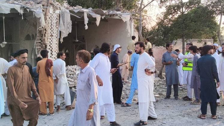 16 killed in suspected suicide bombing near police compound in NW Pakistan KHYBER PAKHTUNKWA, PAKISTAN - SEPTEMBER 18: People gather around a damaged mosque following a suicide bombing targeting a police compound in Kohat district of Khyber Pakhtunkhwa province, Pakistan, on September 18, 2026. At least 16 people, including 11 civilians and five police officers, were killed and over 50 others wounded in a suspected suicide bombing targeting a police compound in northwestern Pakistan during Friday congregational prayers, officials said. The casualties occurred when an explosives-laden vehicle rammed into the Old Police Lines gate in Kohat district of Khyber Pakhtunkhwa province, a senior police official said, according to local broadcaster G  Copyright: x2026xAnadoluxMohamudxIsmailxKulanex