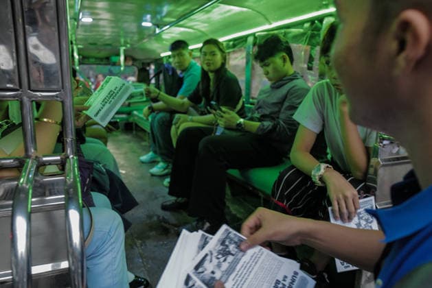 September 18, 2026, Philippines: Students giving pamphlets to commuters during the Black Friday Protest on Friday at Taft Ave, Metro Manila. It coincided with the Black Friday Protests from different universities and a preparation for the mass movement on Sept. 21 for the Martial Law anniversary. Among the calls were for the alleged human rights abuses, corruption, and the Pax Silica initiative under the administration of President Ferdinand Marcos Jr. Philippines  - ZUMAr240 20260918_zip_r240_022 Copyright: xMarcxDominicxRostratax