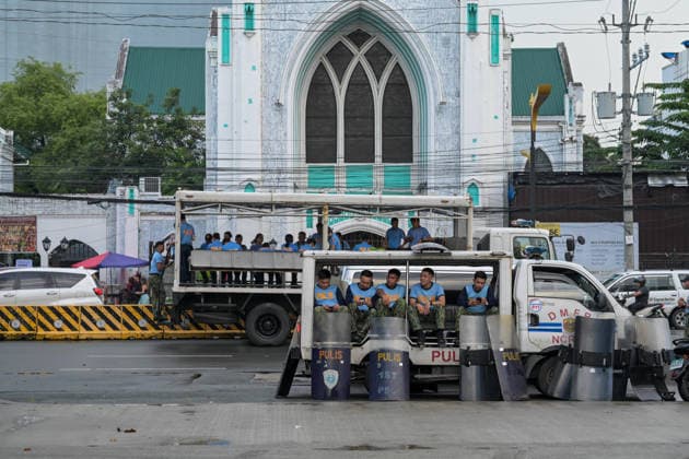 September 18, 2026, Philippines: A group of police resting and waiting for the Black Friday Protest by the students on Friday at Taft Ave, Metro Manila. It coincided with the Black Friday Protests from different universities and a preparation for the mass movement on Sept. 21 for the Martial Law anniversary. Among the calls were for the alleged human rights abuses, corruption, and the Pax Silica initiative under the administration of President Ferdinand Marcos Jr. Philippines - ZUMAr240 20260918_zip_r240_053 Copyright: xMarcxDominicxRostratax